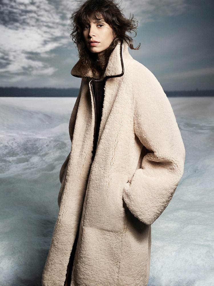 LEATHER-TRIMMED SHEARLING COAT