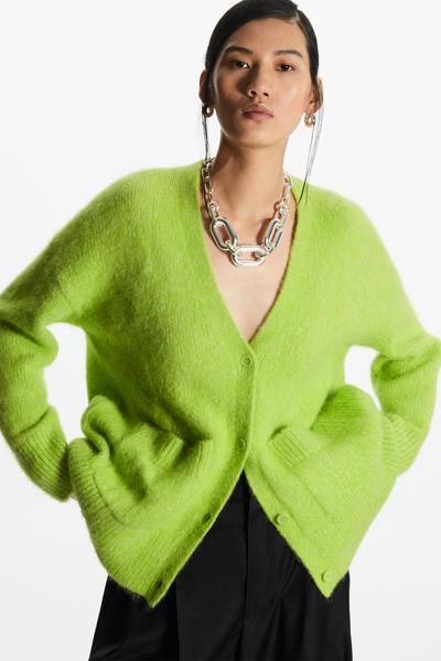 green cardigan with pockets