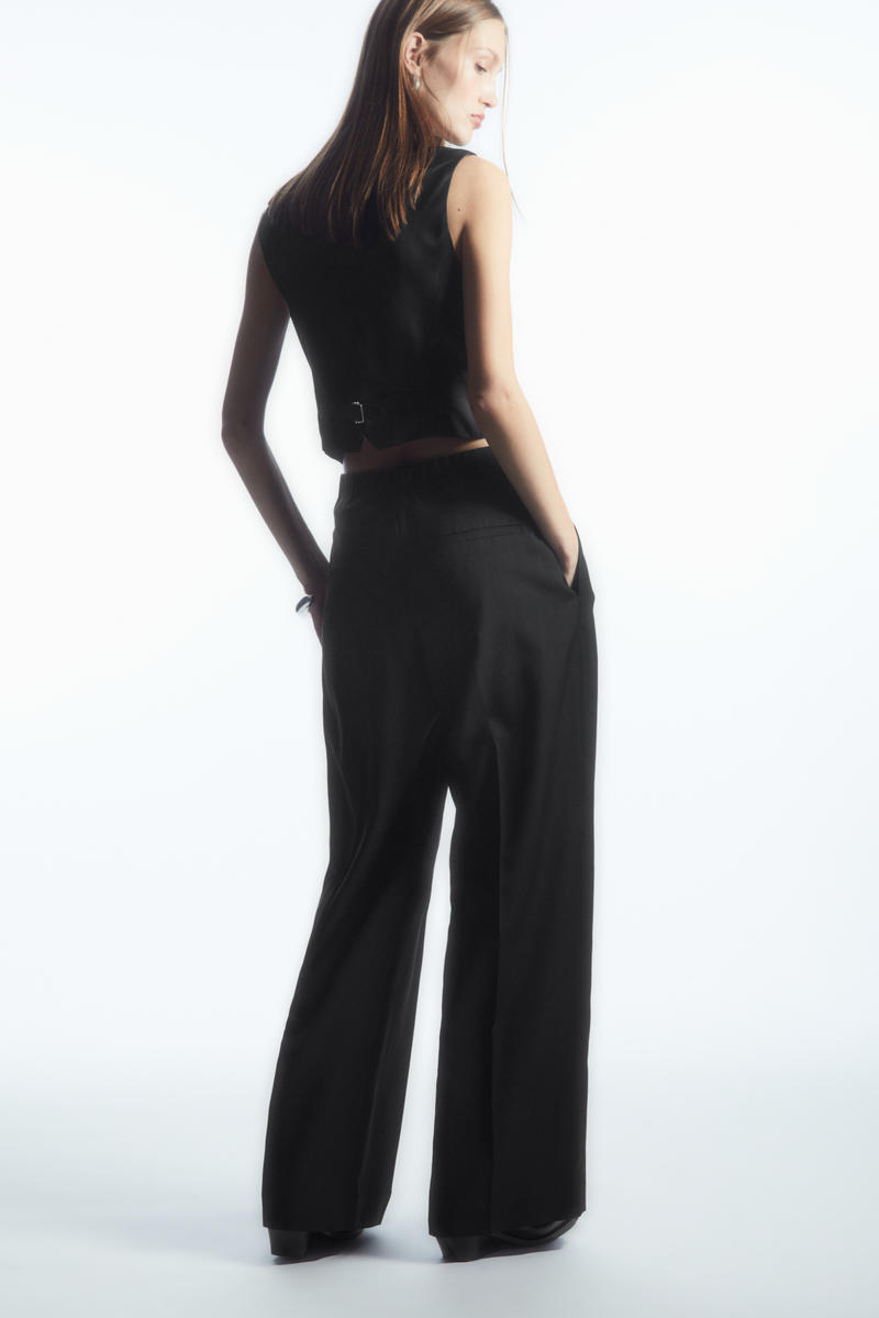 PLEATED WIDE-LEG WOOL TROUSERS