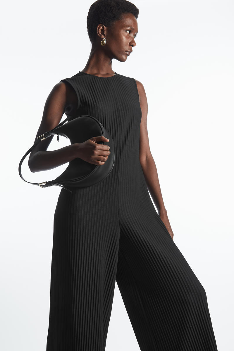 SLEEVELESS PLEATED WIDE-LEG JUMPSUIT