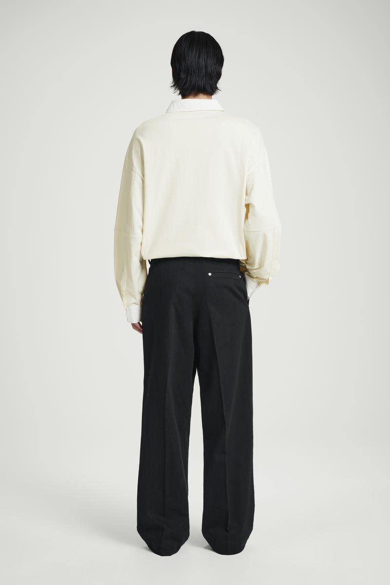 PLEATED WIDE-LEG DENIM TROUSERS