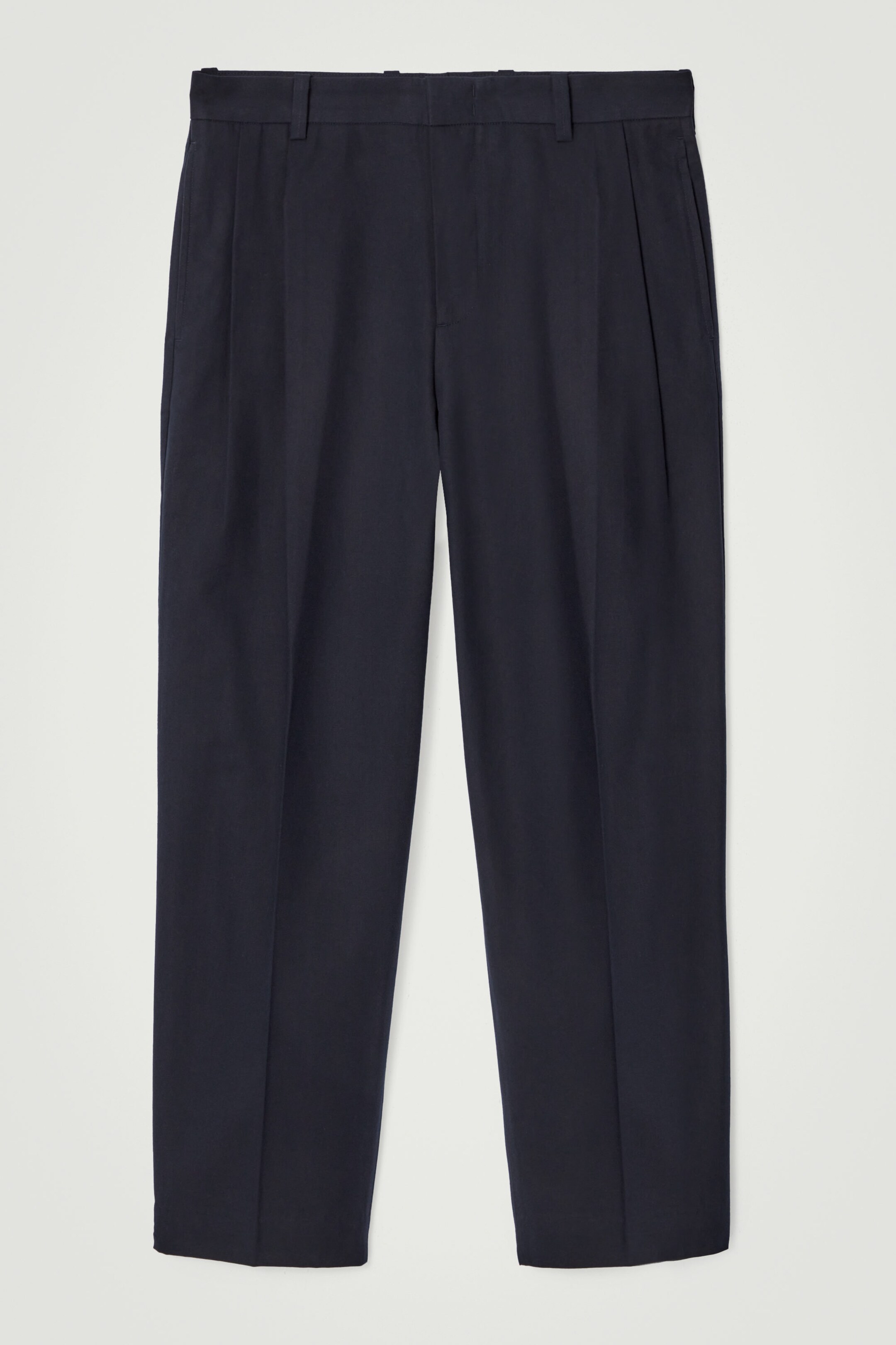 RELAXED PLEATED COTTON TAPERED TROUSERS