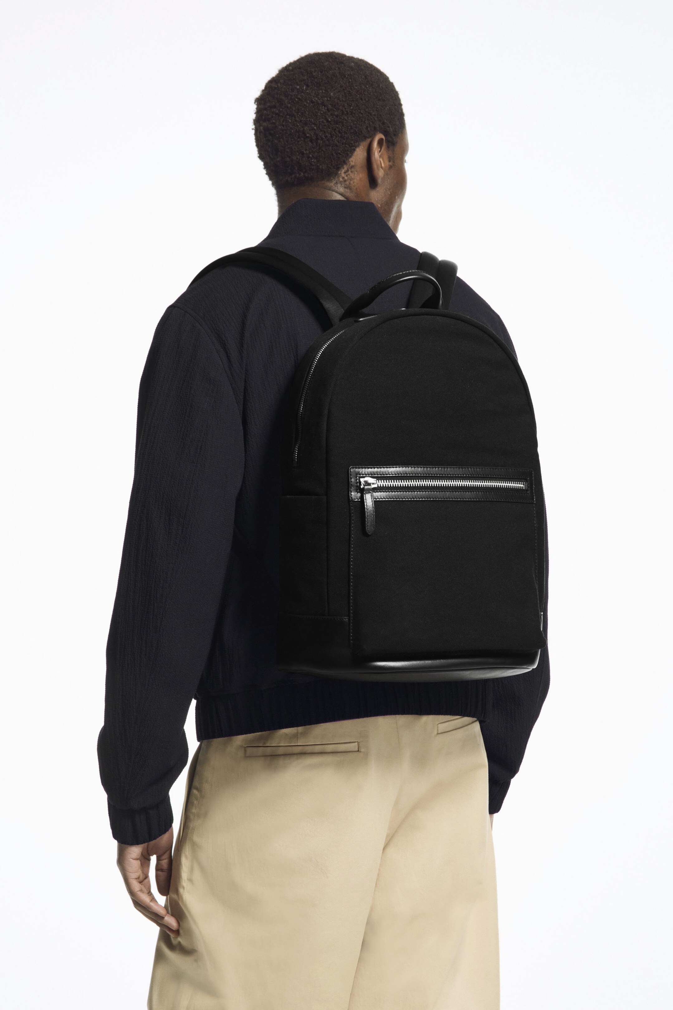 LEATHER-TRIMMED CANVAS BACKPACK