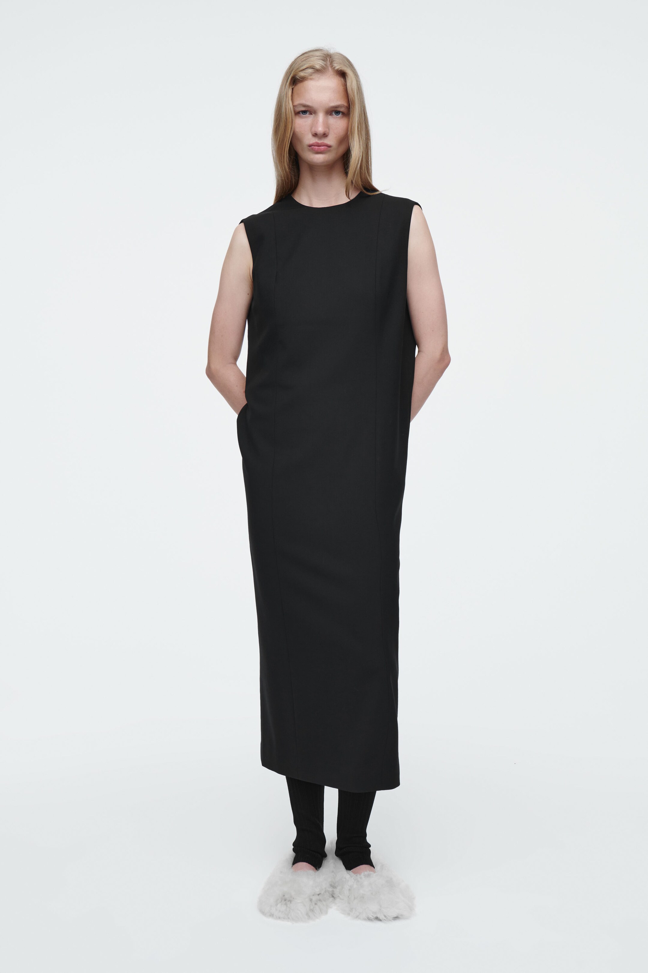 THE SLEEVELESS TAILORED WOOL DRESS