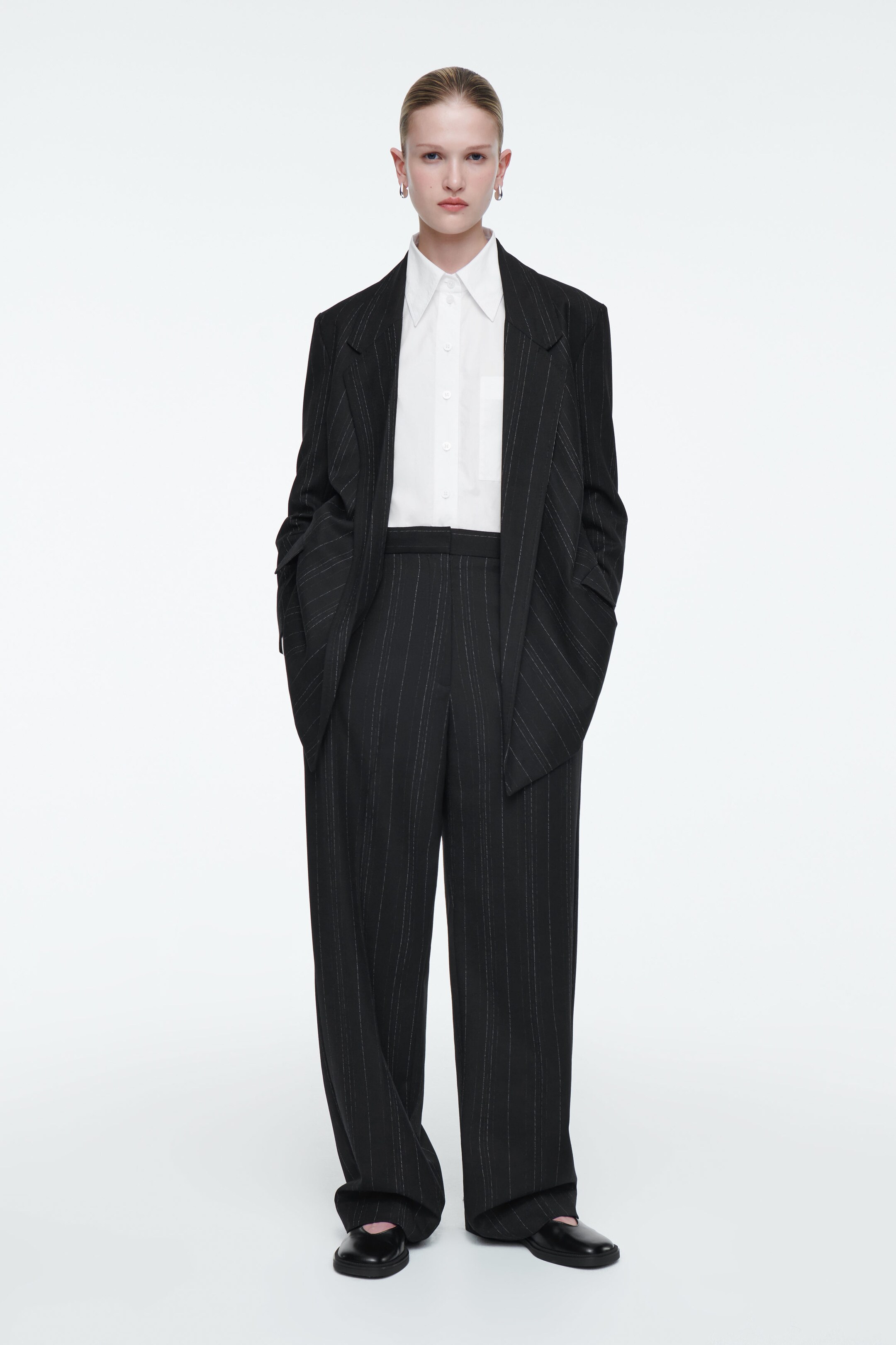 RELAXED PINSTRIPED BARREL-LEG TROUSERS