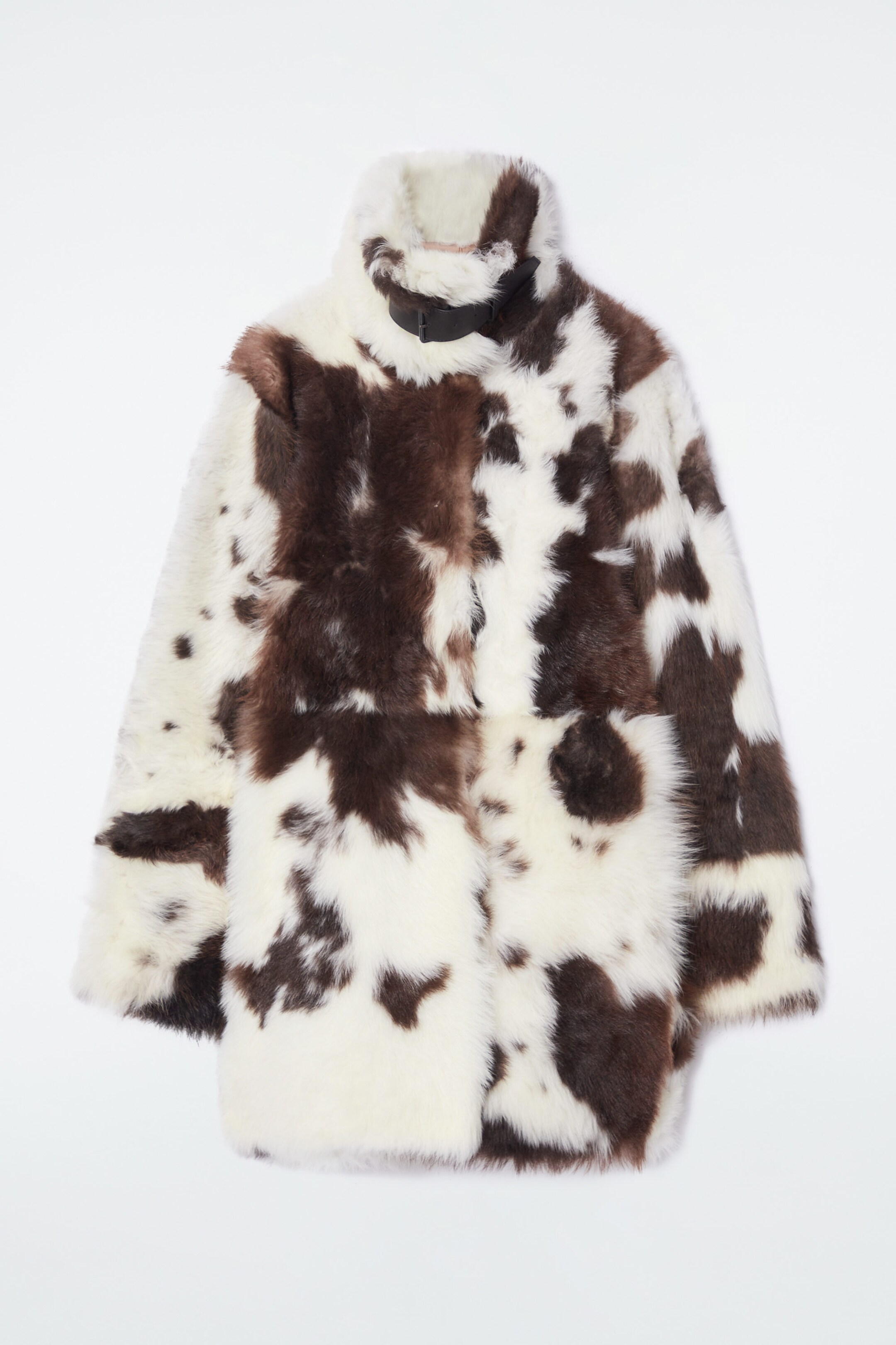 THE FUNNEL-NECK SHEARLING COAT