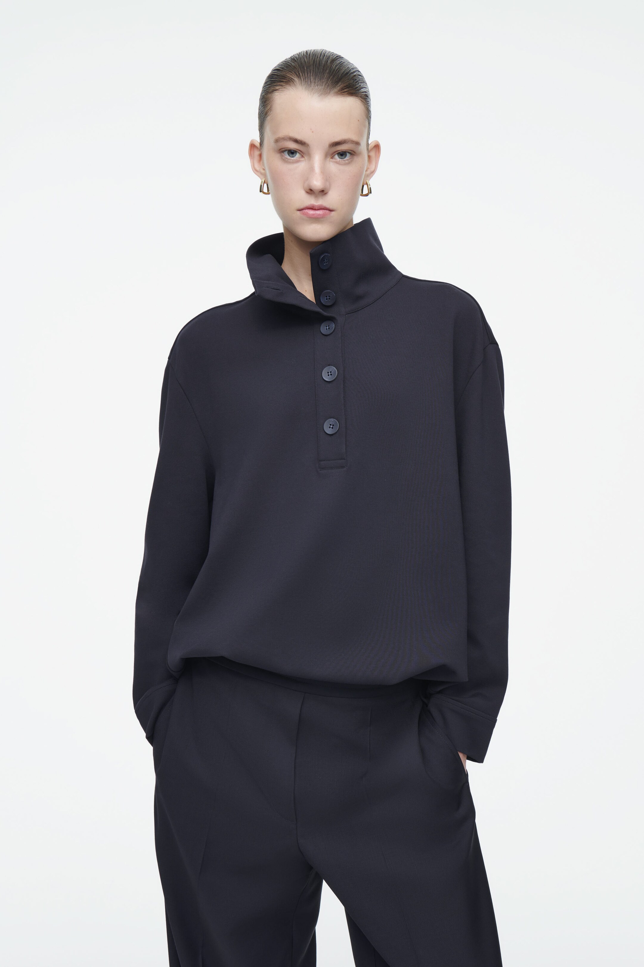 BUTTONED FUNNEL-NECK TOP