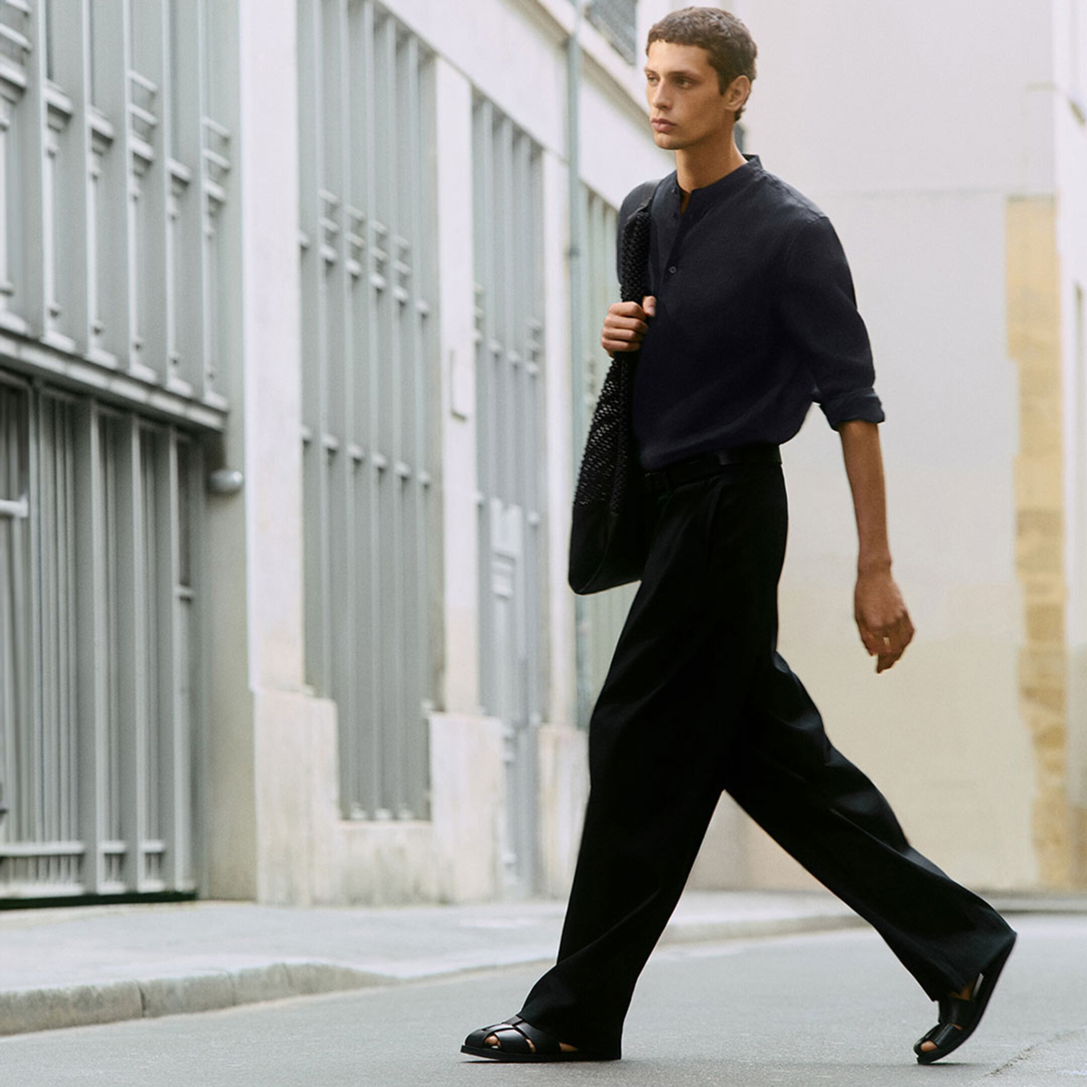 man in relaxed trousers