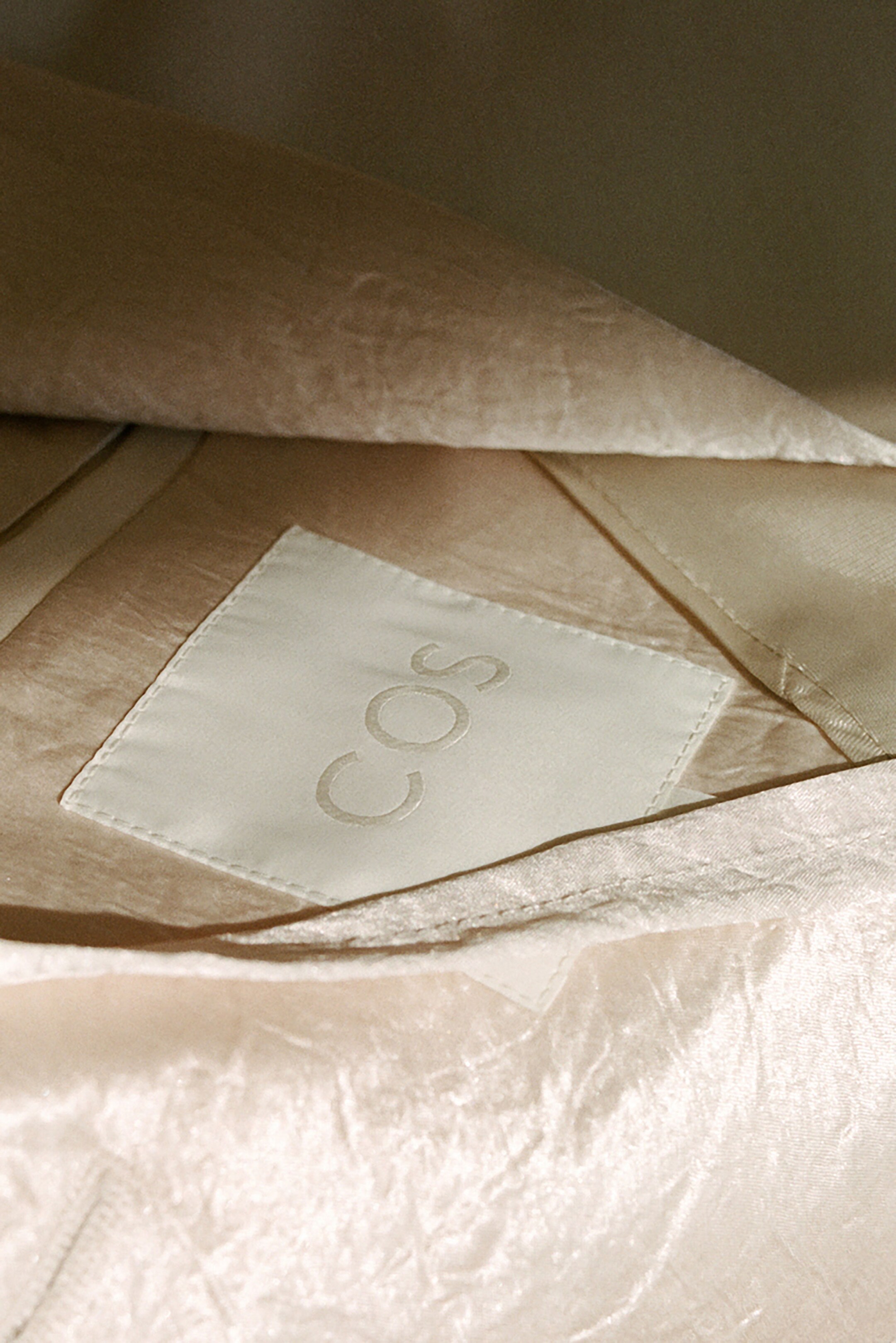 COS Label on silk garment