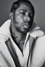 Placeholder for: Curtis Harding wearing COS jumper and coat