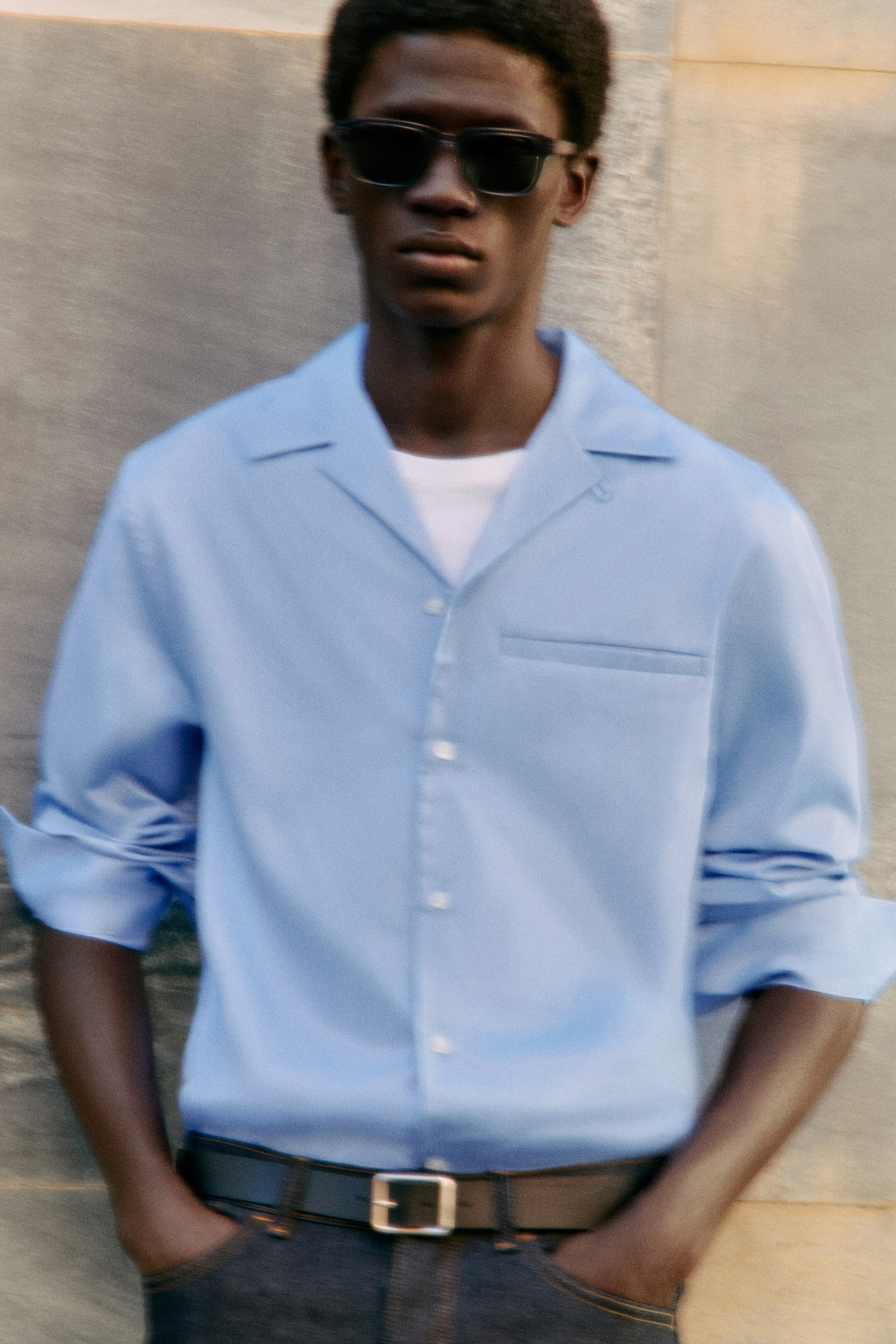 Man wearing blue shirt