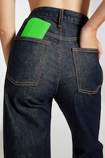 Placeholder for: Desserto wallet in back pocket of woman's jeans