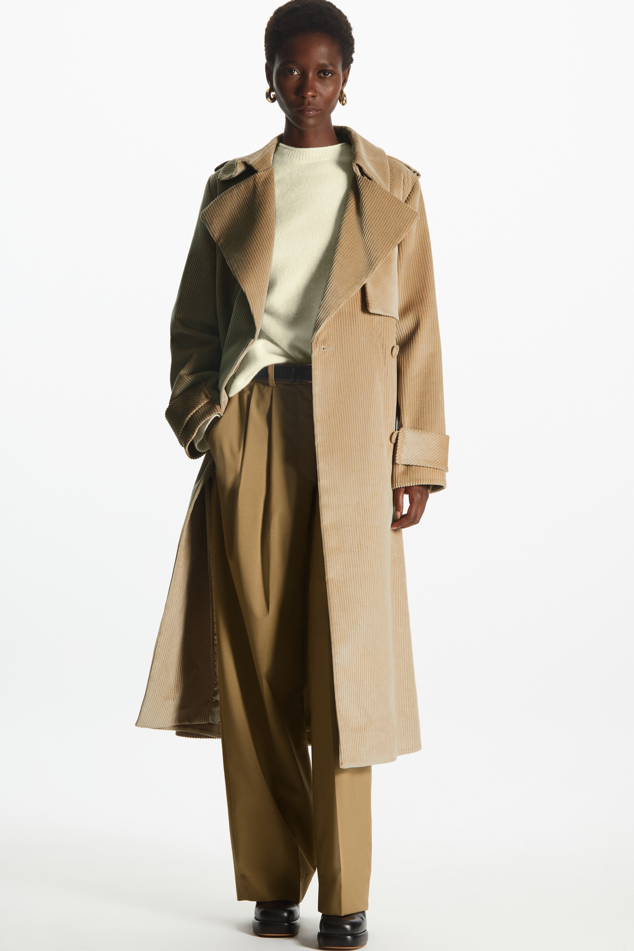 Woman wearing nude courdroy trench