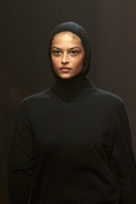 Placeholder for: Model wears black balaclava and black top