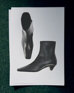 Placeholder for: black leather boots