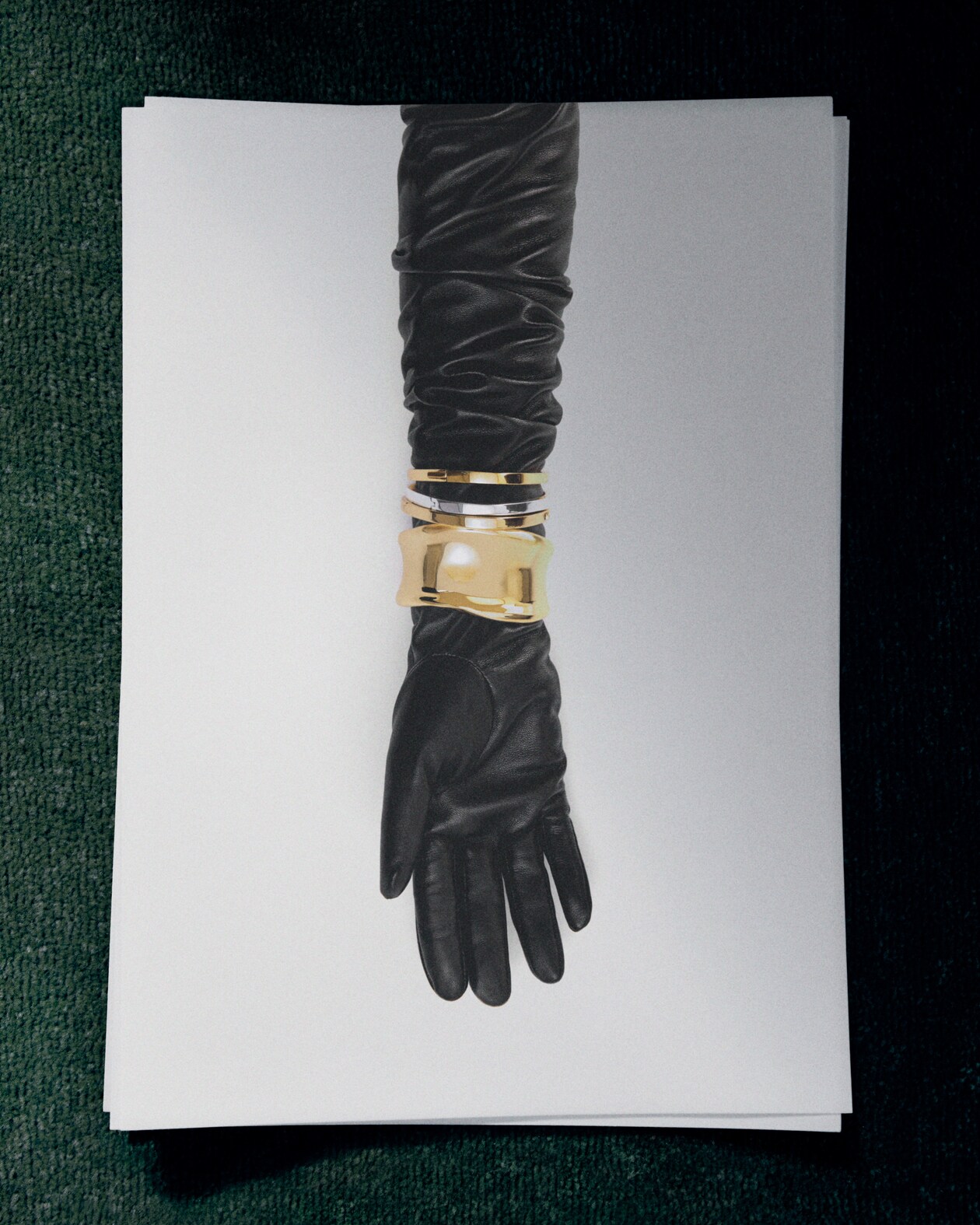 black glove and braceletes