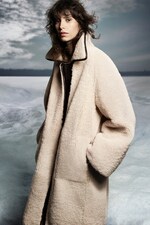 Placeholder for: person wearing shearling jacket