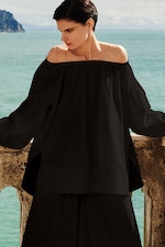 Placeholder for: woman in off the shoulder top