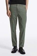 Placeholder for: Person wearing green trousers